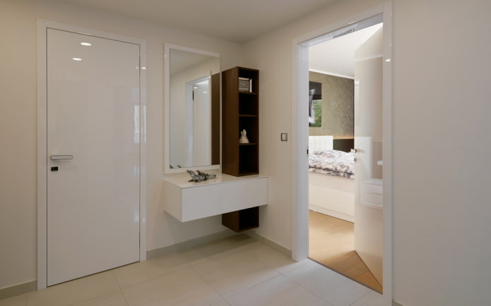 mirror with a cabinet in the interior of the hallway