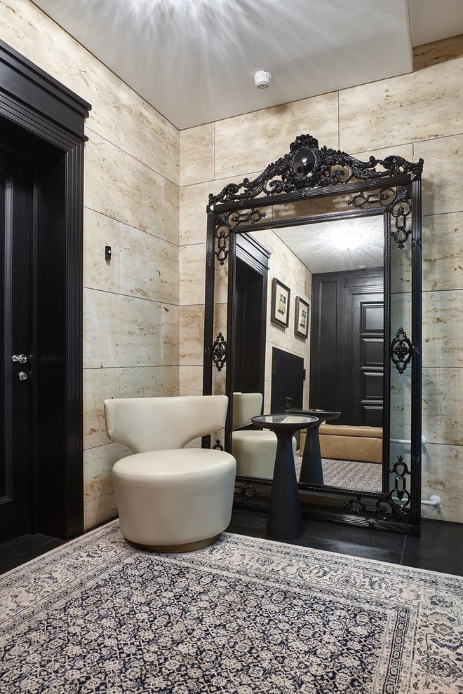 large mirror in the interior of the hallway