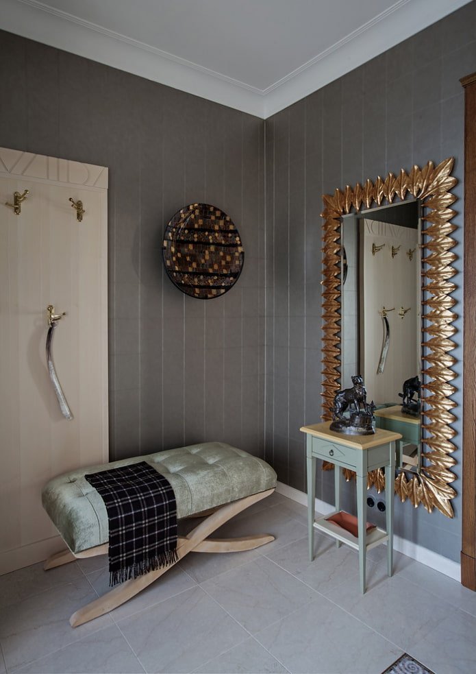 mirror in a forged frame in the interior of the hallway