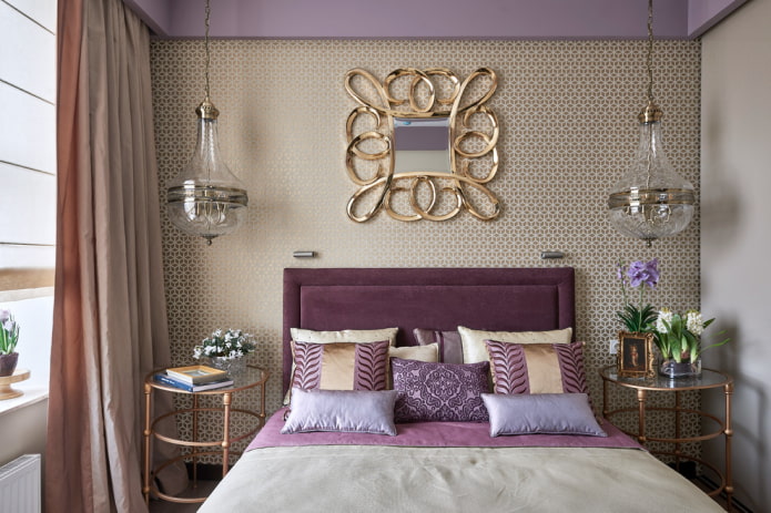mirror in a golden frame in the bedroom interior