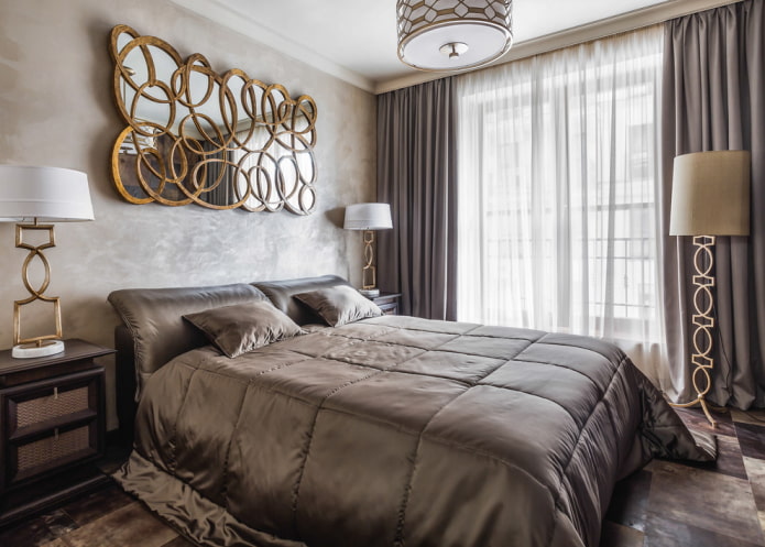mirror above the bed in the bedroom interior