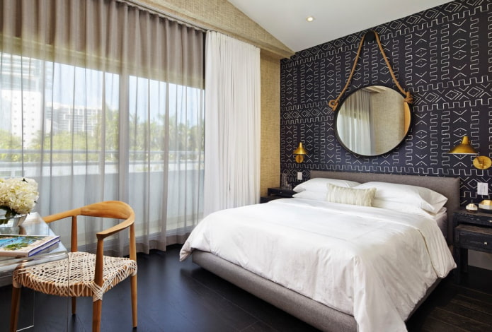 mirror above the bed in the bedroom interior