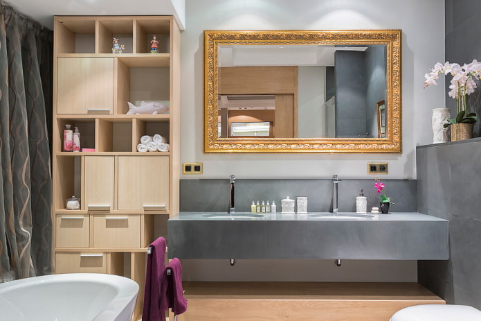 framed mirror in the bathroom interior