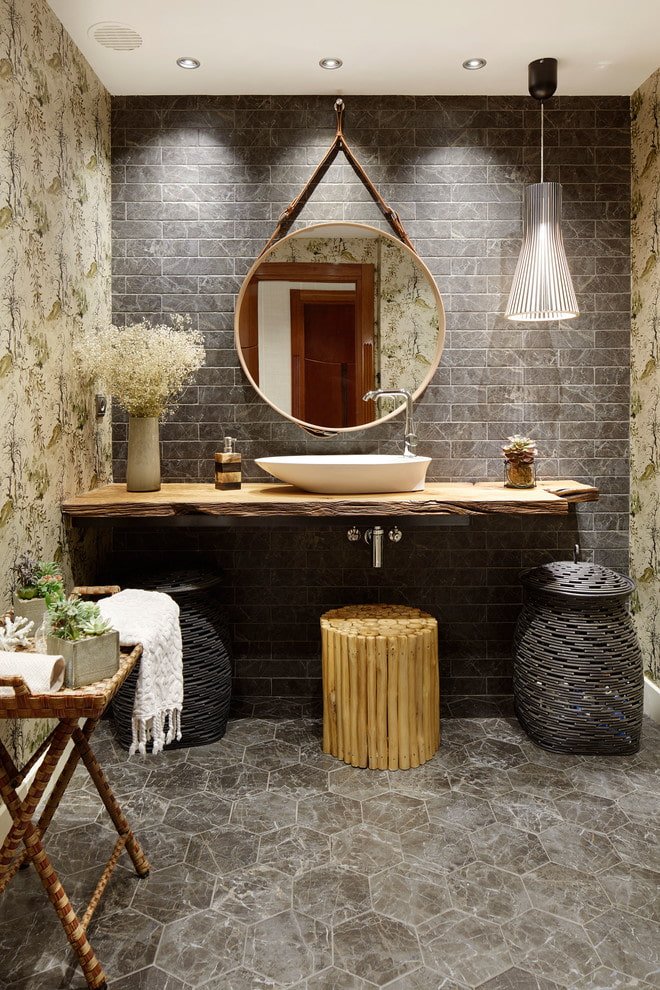 round mirror in the bathroom interior