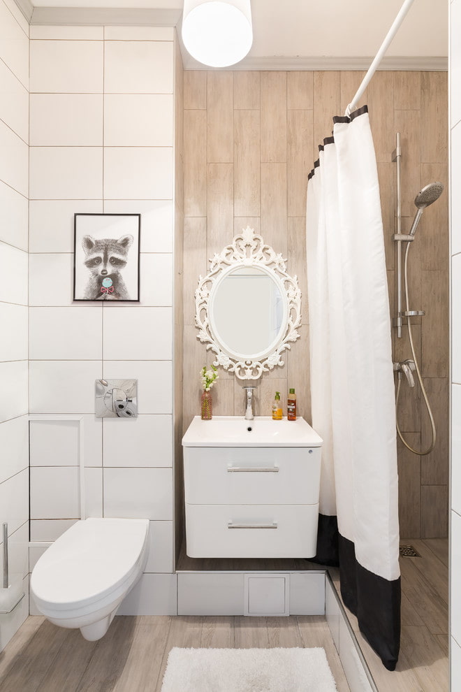 mirror above the washbasin in the bathroom interior