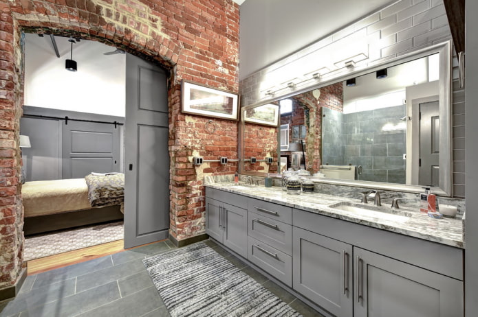 mirror in the bathroom interior in loft style