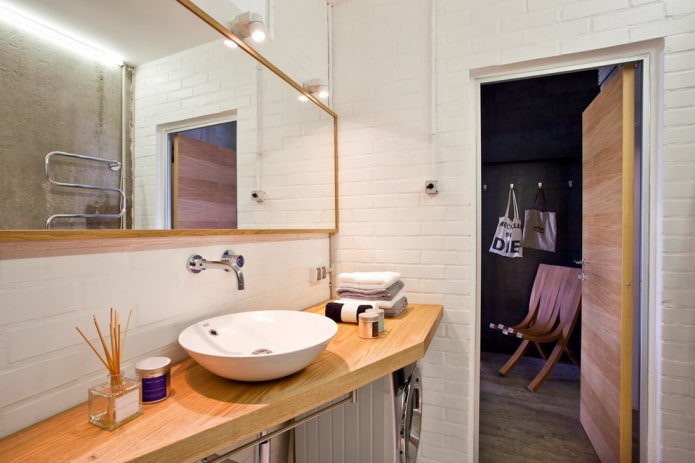 spots above mirror in the bathroom interior
