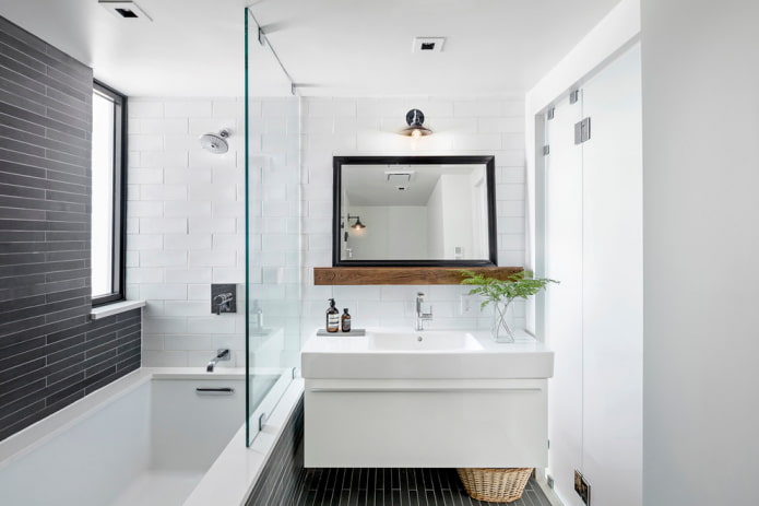 mirror in a black frame in the bathroom interior