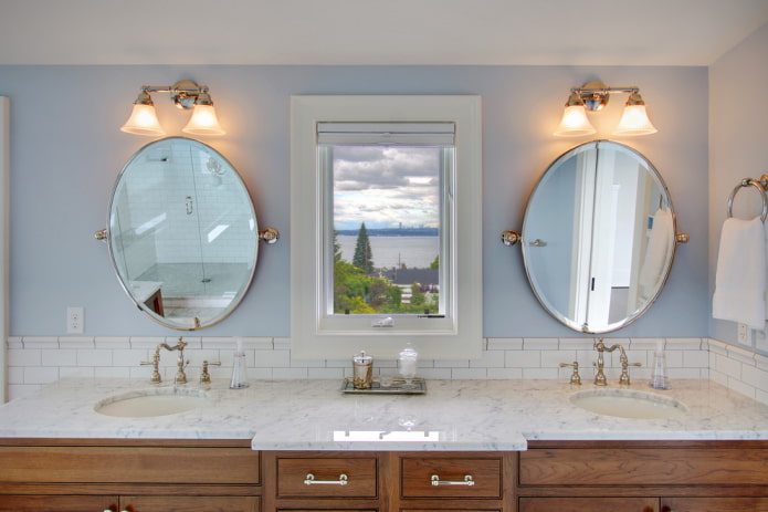 lamps above mirrors in the bathroom interior