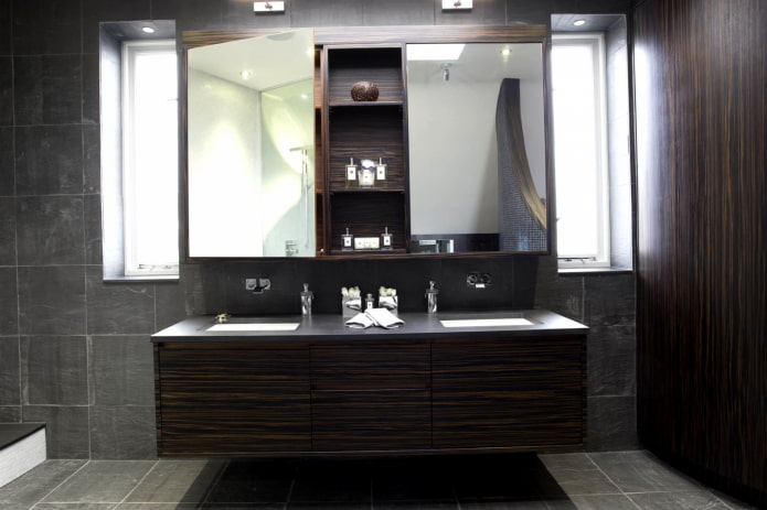 mirror with a cabinet in the bathroom interior