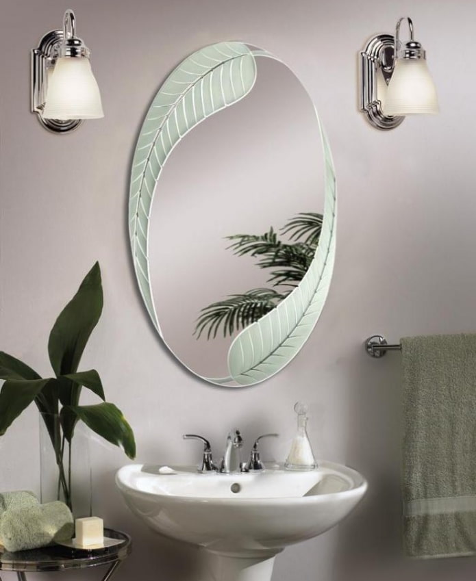 mirror with sandblasted design in the bathroom interior