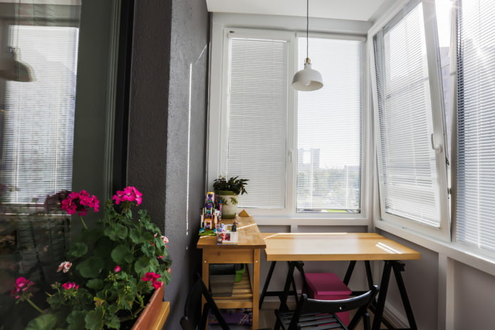 white horizontal blinds on the loggia