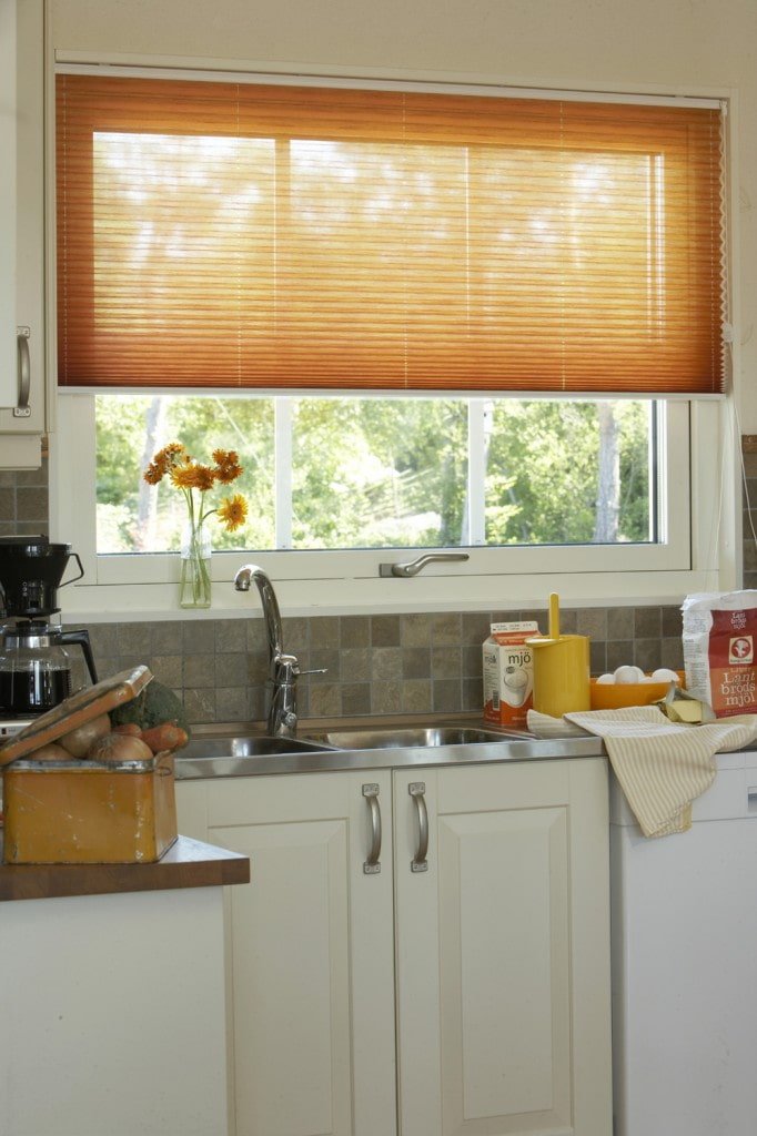 Pleated blinds over the sink