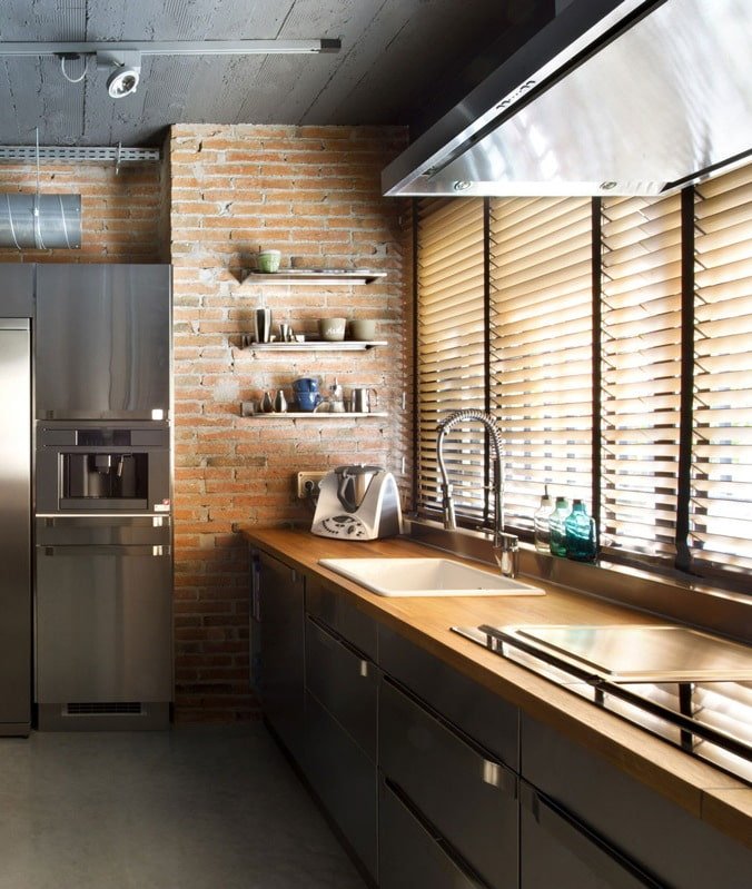 Horizontal blinds in the kitchen near the window