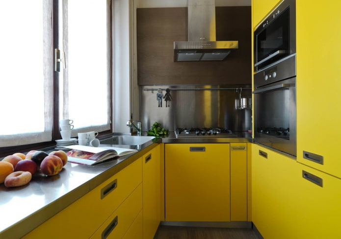 furniture and appliances in the kitchen interior in yellow tones