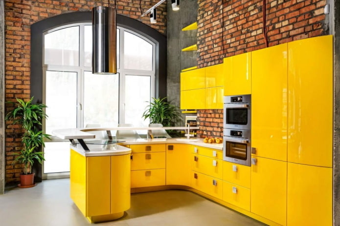 kitchen in yellow tones in loft style