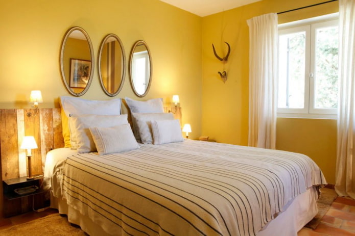 textile decoration of the bedroom in yellow tones