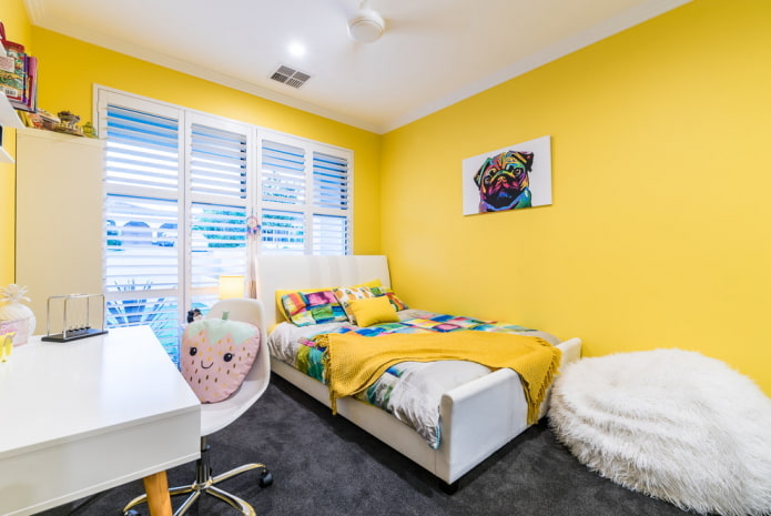 girl's bedroom interior in yellow tones