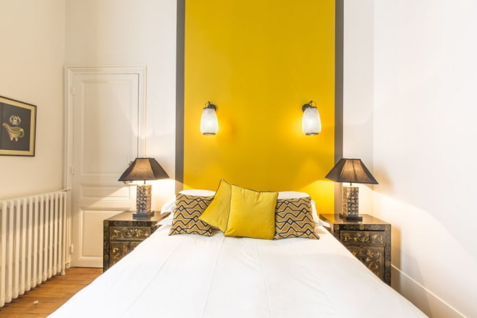 decor and lighting in the bedroom interior in yellow tones