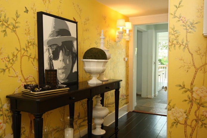 hallway with walls decorated with wallpaper with a plant pattern