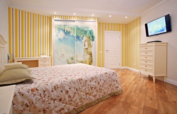 striped yellow wallpaper and light furniture