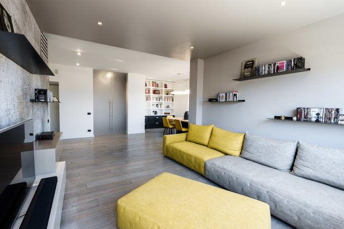gray-yellow sofa in the interior