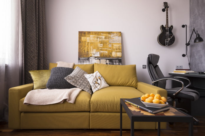 combination of a yellow sofa with a blanket