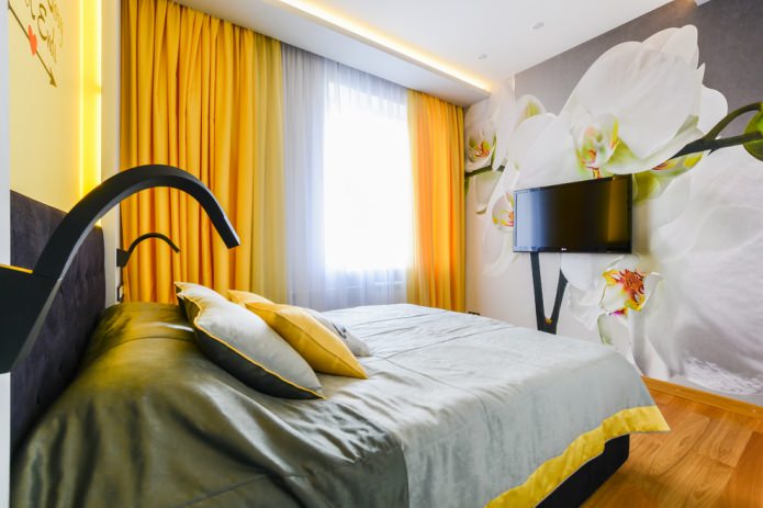 bedroom with yellow curtains and photo wallpaper
