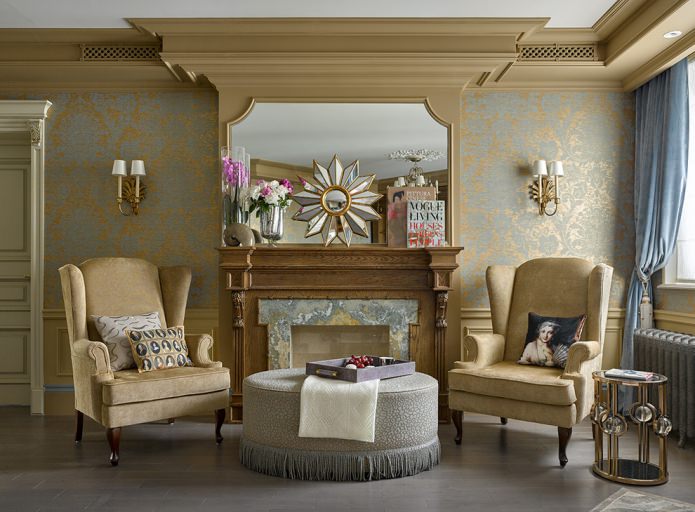 blue wallpaper with a gold pattern