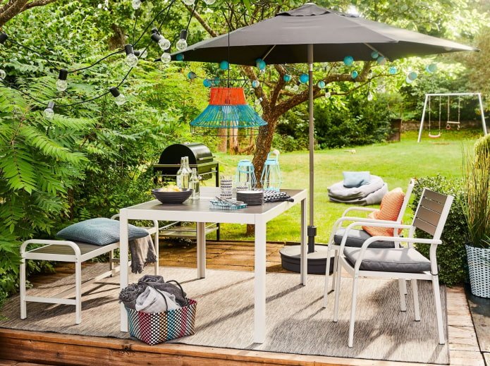 dining area with an umbrella in the country