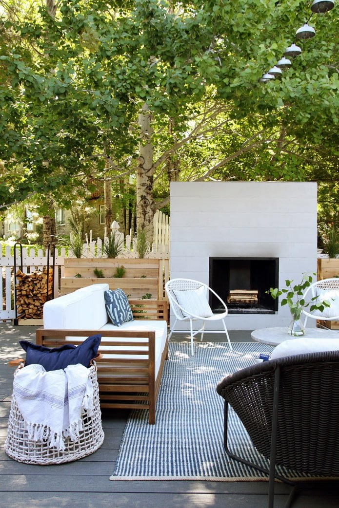 a place to relax at the dacha with a fireplace