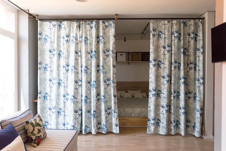 zoning the bedroom with curtains