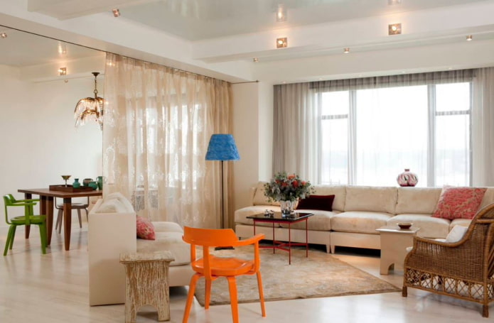 zoning with curtains in the interior of the kitchen-living room