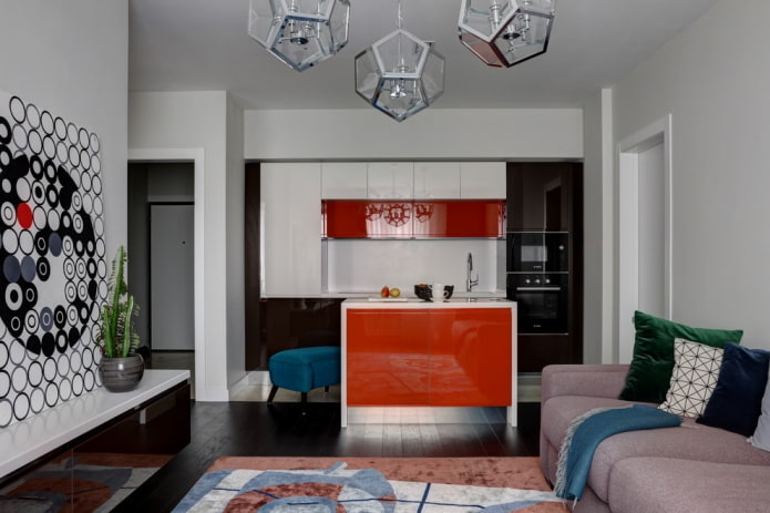 zoning with an island in the interior of the kitchen-living room
