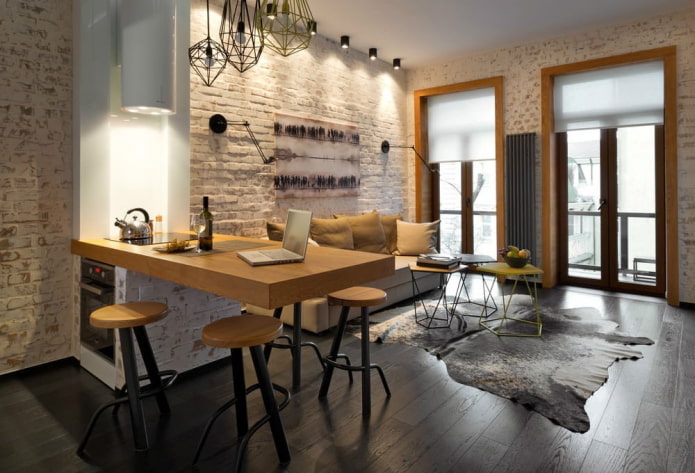 zoning with a bar counter in the interior of the kitchen-living room