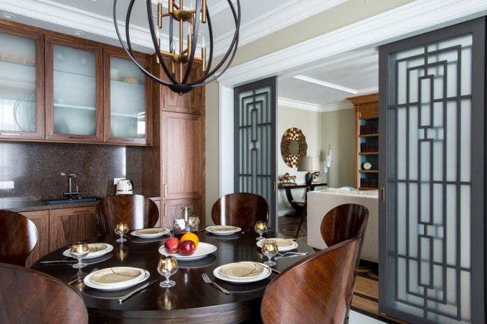 zoning with sliding doors in interior of the kitchen-living room